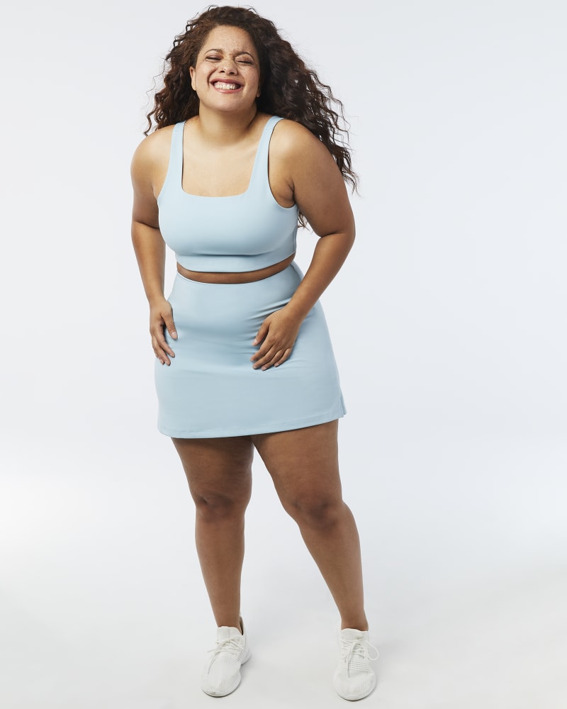 Plus size model with pear body shape wearing Susana Sports Bra by Girlfriend Collective | Dia&Co | dia_product_style_image_id:157463